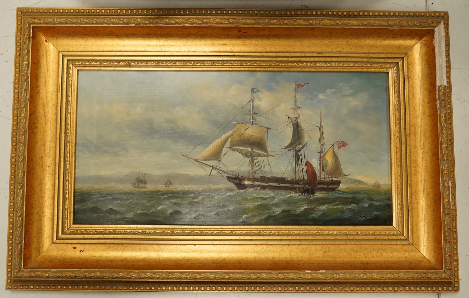 Shipling, oil on board, British naval ships before a coastline, signed, 19 x 39cm, gilt framed. Condition - fair, losses to the frame